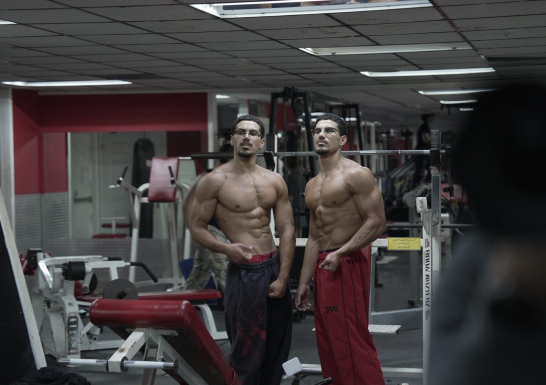Louis and Anthony in the gym mirror